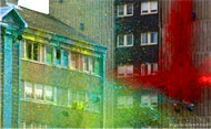 The side of a building is covered in paint during filming for the next Sony BRAVIA advert